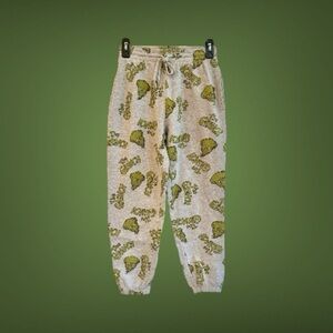 THE GRINCH, WOMENS PLUSH JOGGERS IN GREY COLOR WITH CHARACTER PRINT. SIZE S